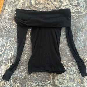 Off-the-shoulder black sweater